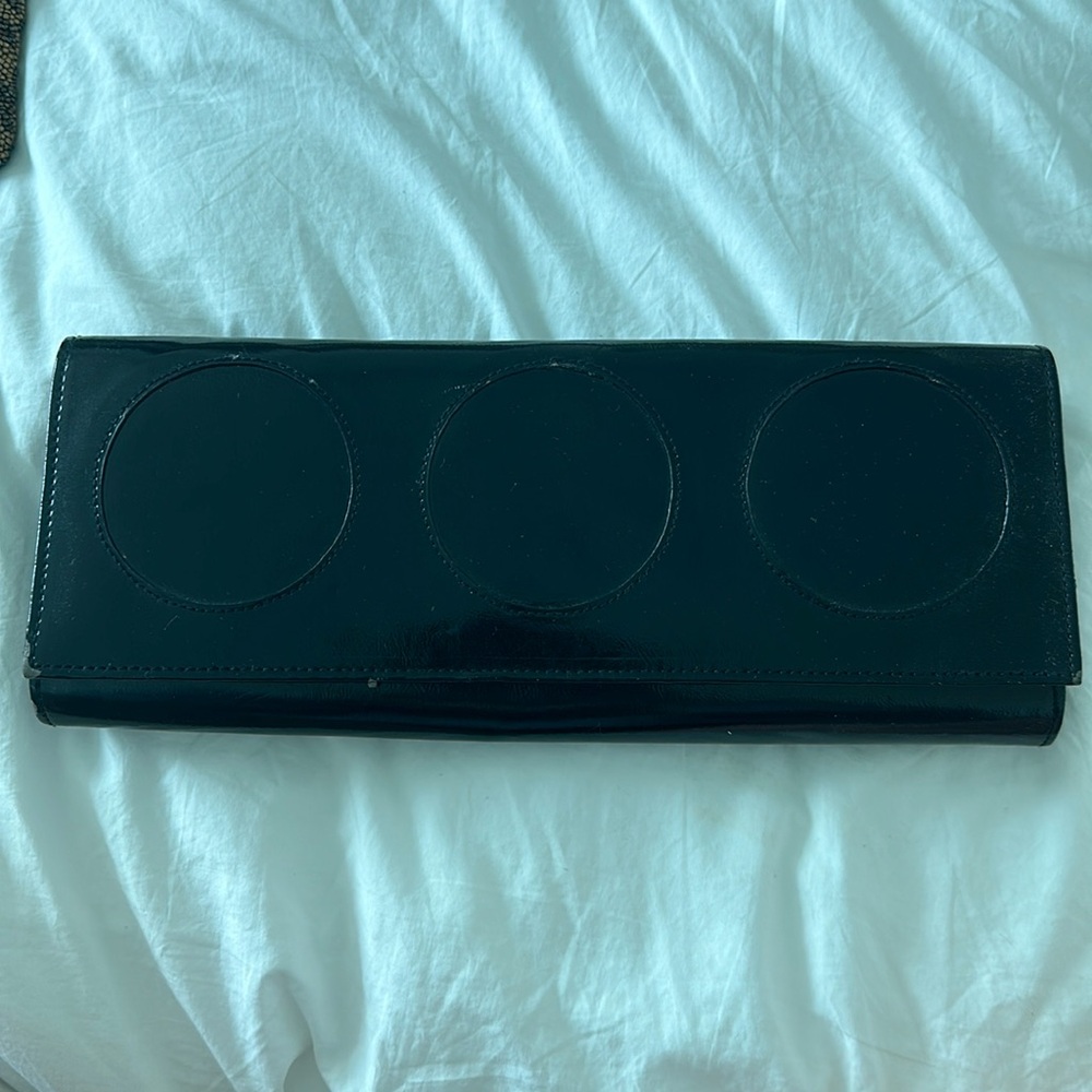 Lisa Perry, black patent leather clutch